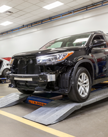 Toyota on vehicle lift | Longo Toyota of Prosper in Prosper TX