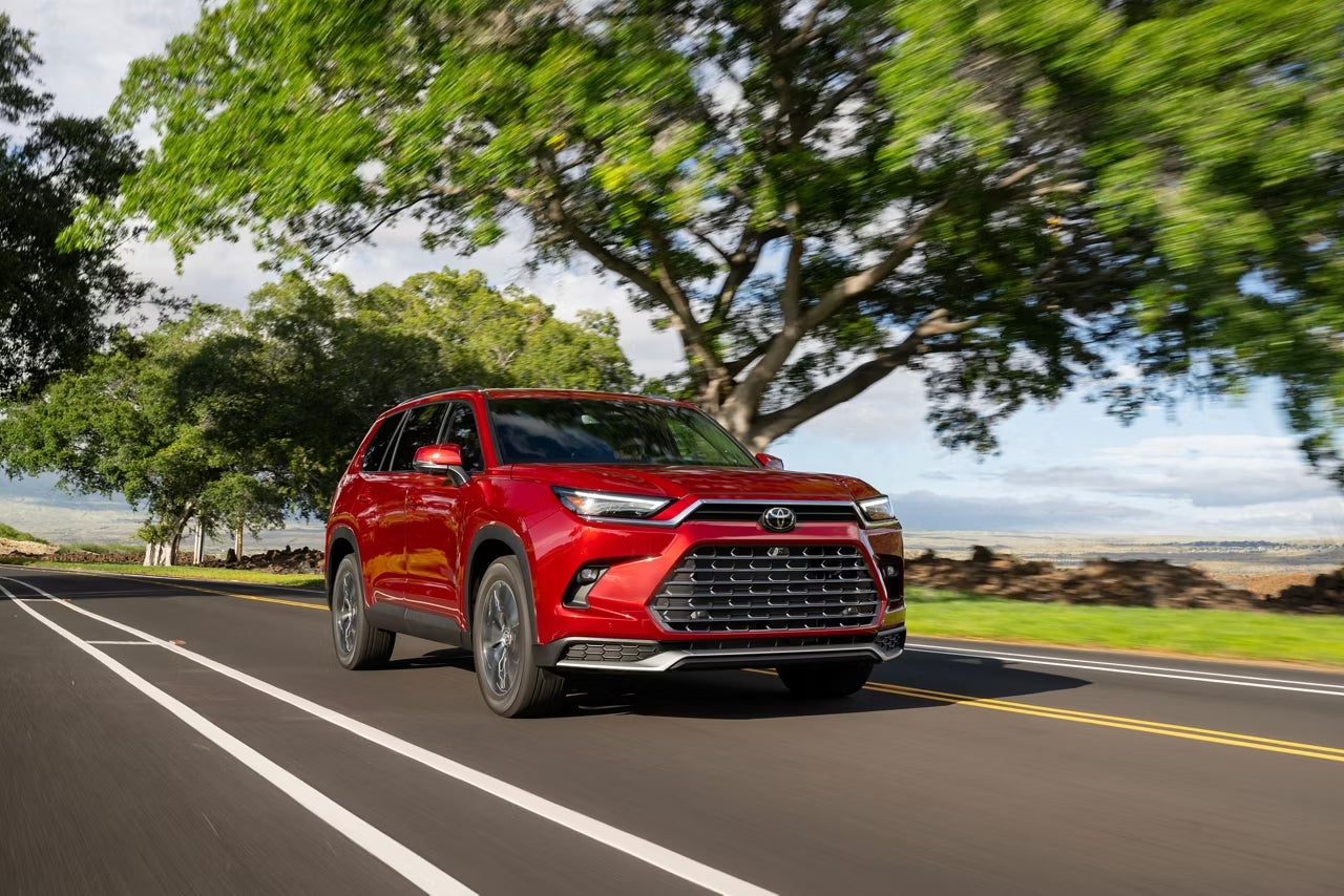 A red 2026 Toyota Grand Highlander in Prosper, TX